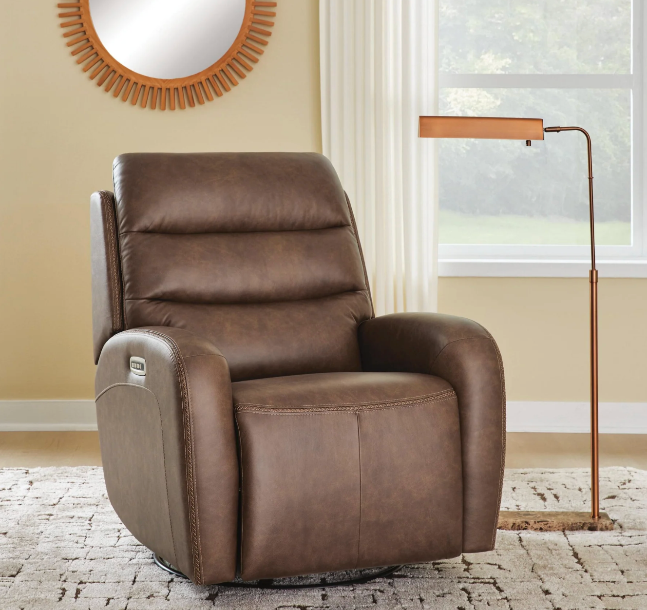 Motion Max Swivel Power Glider Recliner by Signature Design by Ashley. One-touch power reclining with adjustable positions, USB-C ports, Top grain leather on seating surface, gentle gliding and 270-degree swivel.