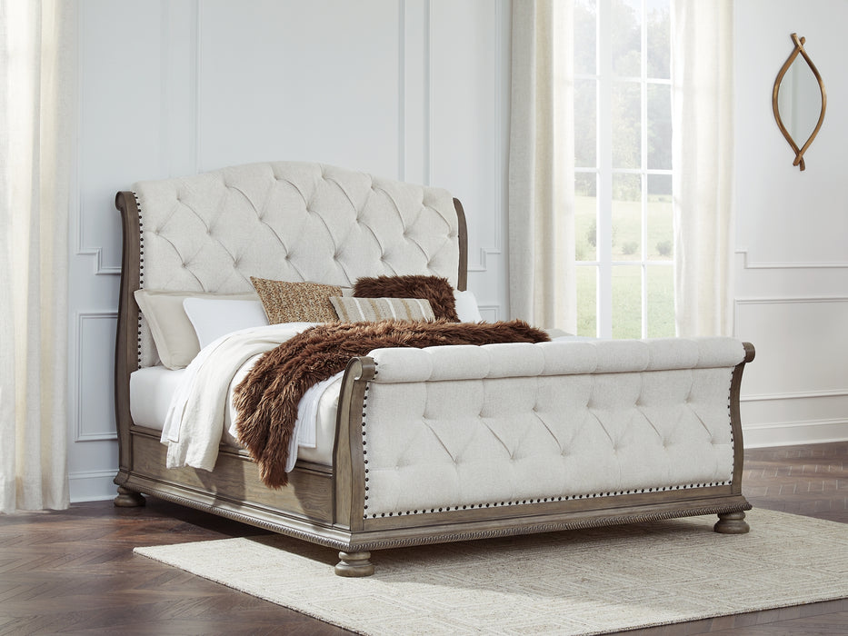 Ardenfield California King Upholstered Sleigh Bed with Mirrored Dresser and Nightstand