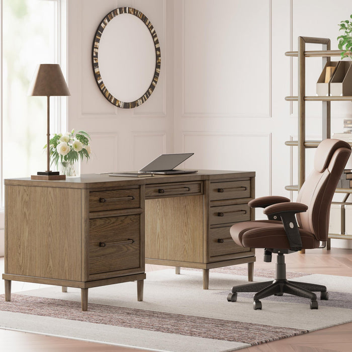 Home office with wooden desk, chair, and bookshelf.